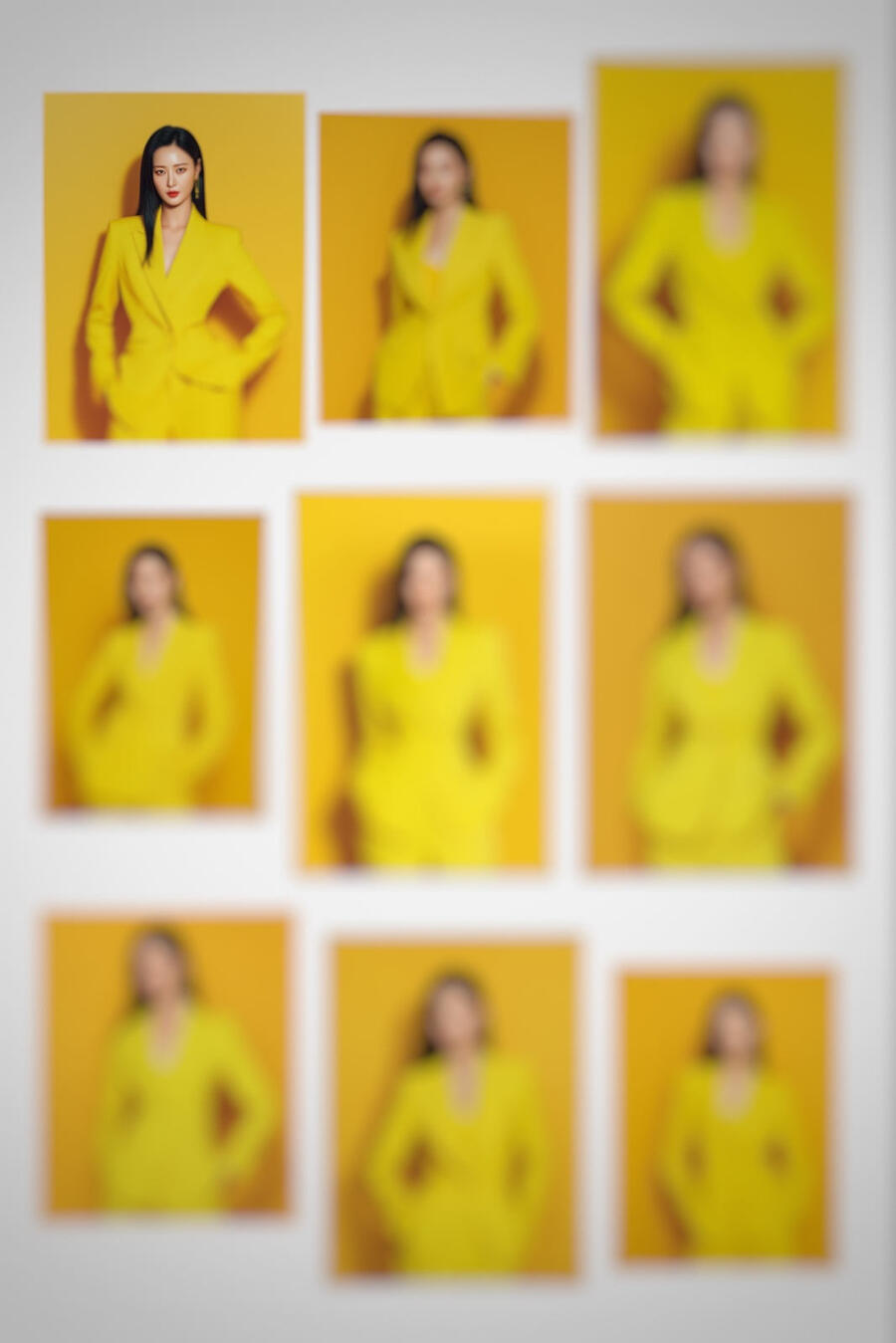 霧系列人像作品《權域之境｜純白權域》，女性身穿流動感白色高級長裙行走於極簡背景之中，裙擺隨動作展開，畫面呈現高級時尚與權威氣場。 Portrait from The Haze series titled “Domain of Dominion – Pure White Realm”, featuring a woman in a flowing white couture dress moving through a minimal studio space, with dramatic fabric m